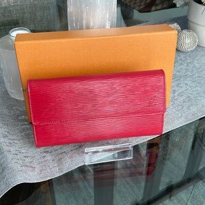 LV red leather Sarah long wallet.